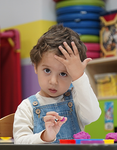 Teacher supporting students during classroom activity